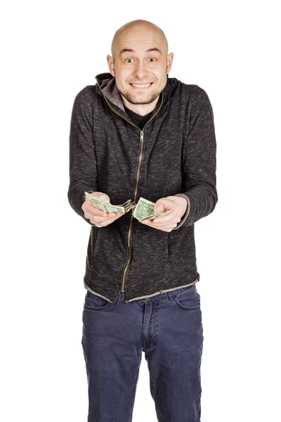 Mladý muž, který držel hromadu peněz — Stock fotografie