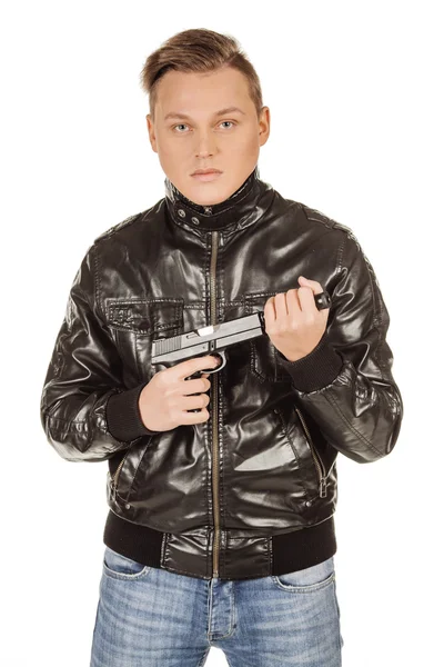 Lönnmördare syftar hans pistol på vit bakgrund — Stockfoto