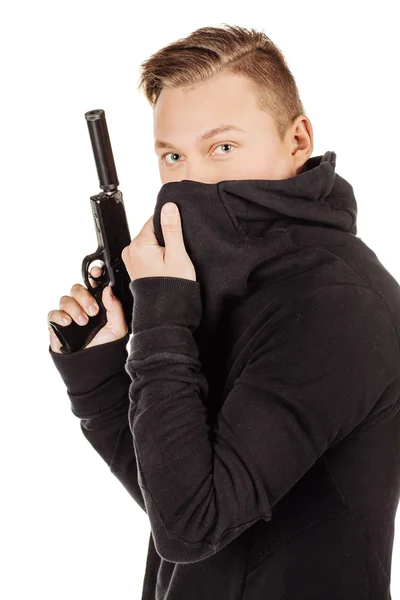 Jeune homme avec arme à feu — Photo