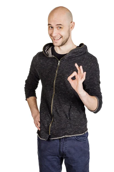 Jonge man maken van gezichtsuitdrukkingen en gebaren — Stockfoto