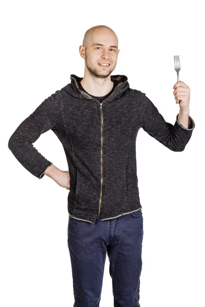 Junger Mann mit Kapuzenpulli und Jeans — Stockfoto