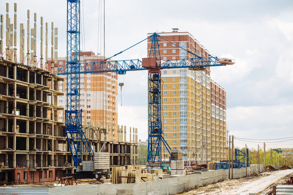 city place for many tall buildings under construction and cranes