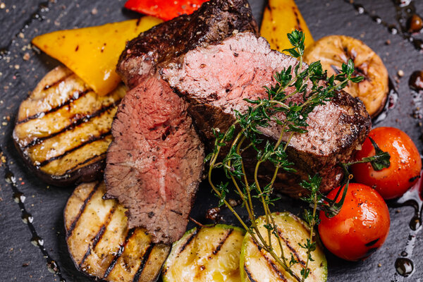 Juicy Beef rump steak from marble beef medium rare with spices