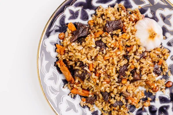 Pilaf with lamb meat and vegetables. Cooked with fried lamb, rice — Stock Photo, Image