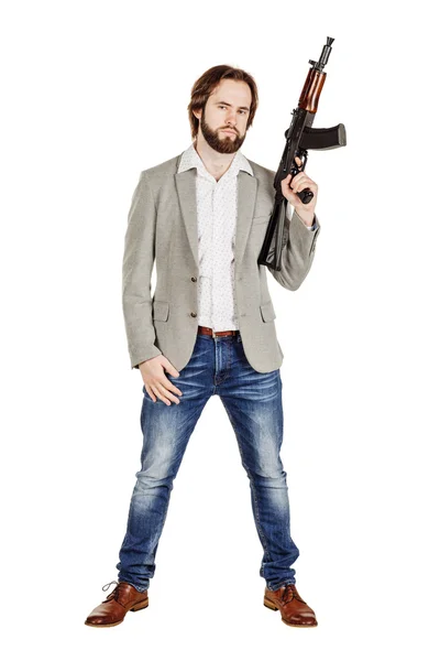 Hombre sosteniendo una ametralladora —  Fotos de Stock
