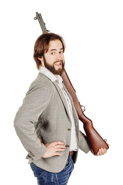 Man holding a machine gun — Stock Photo, Image