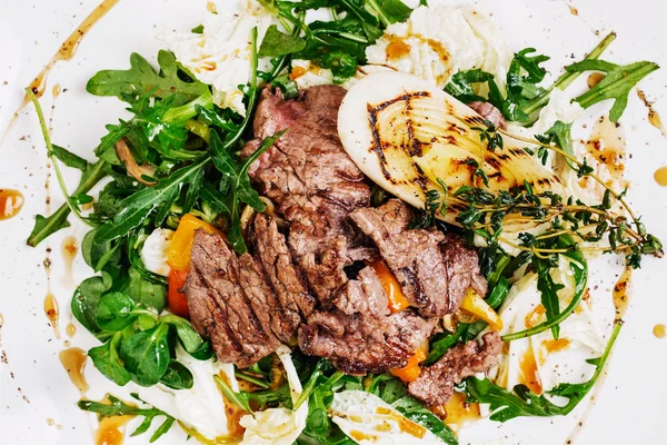 Beef salad on white plate — Stock Photo, Image