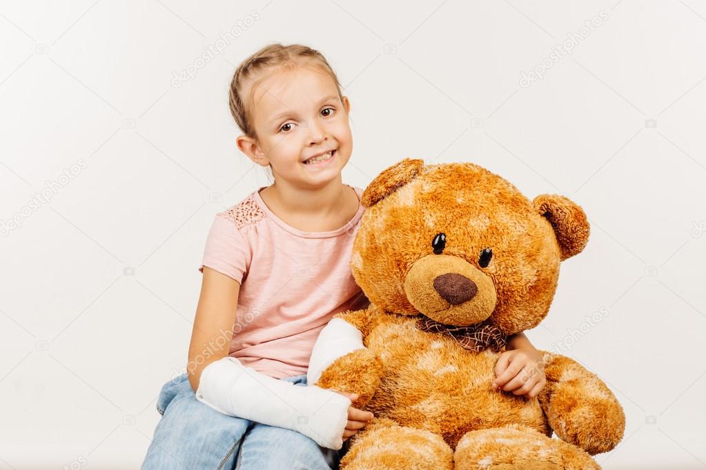 teddy bear with broken arm