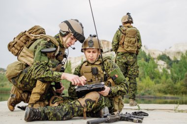 Canadian Army soldiers during the military operation clipart