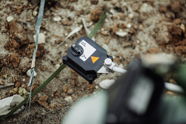 Scientist (radiation supervisor) in protective clothing and gas