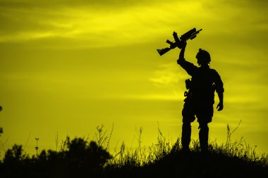 Silhouette of soldier with rifl clipart