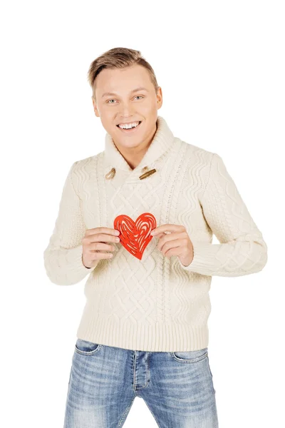 Ung mann som holder et rødt hjerte på hånden isolert på en hvit ba – stockfoto