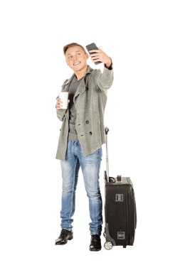 selfie fotoğrafta mobile ile whit üzerinde genç çekici turizm