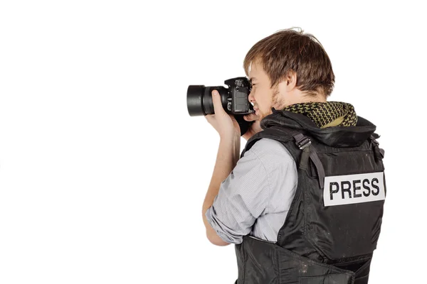 Press photographer wears a protective vest and takes photos with — Φωτογραφία Αρχείου