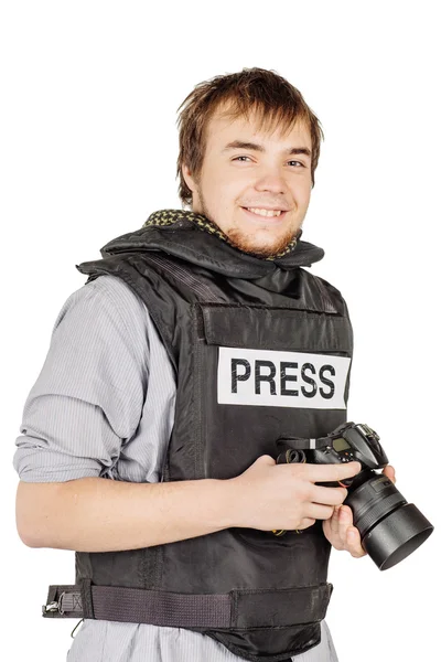 Fotógrafo de imprensa usa um colete protetor e tira fotos com — Fotografia de Stock