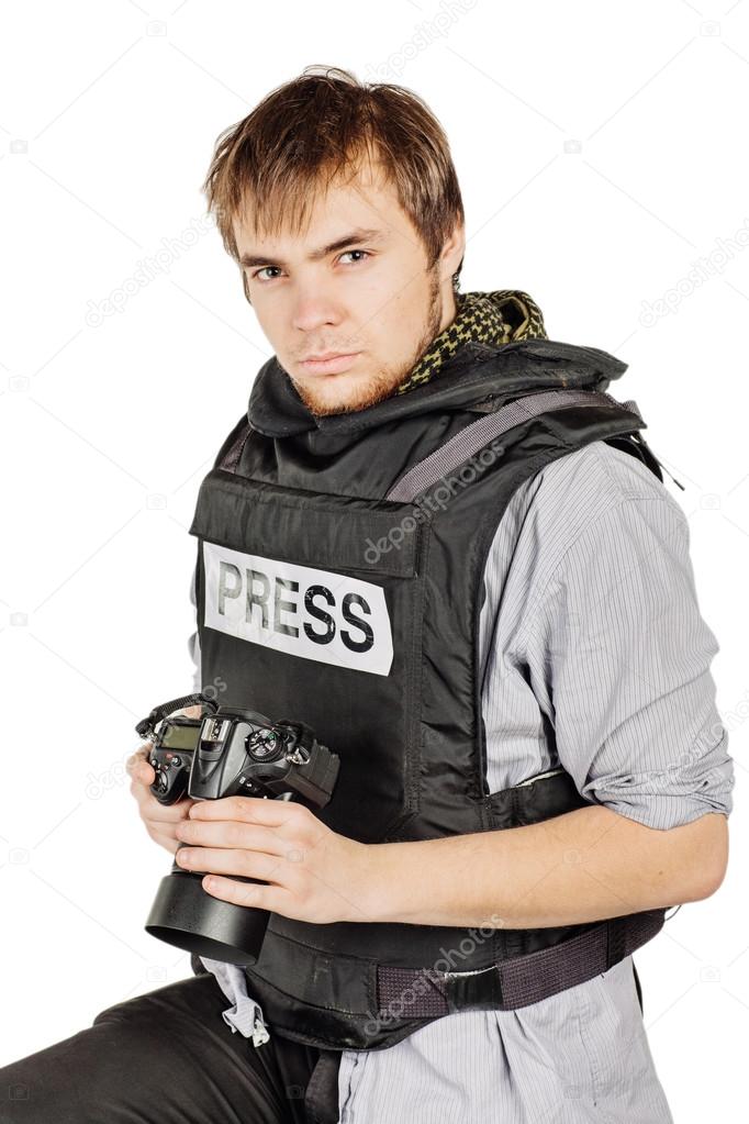 press photographer wears a protective vest and takes photos with