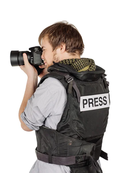 Press photographer wears a protective vest and takes photos with — Φωτογραφία Αρχείου