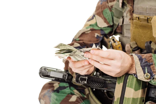 Ranger with money extends his hand — Stockfoto