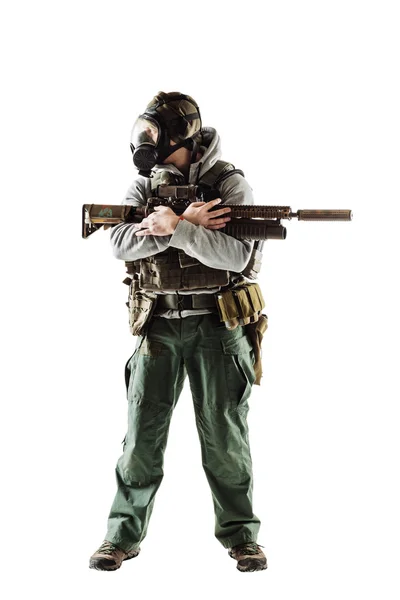 Rebel with gas mask and rifles against a white background — Stock Photo, Image