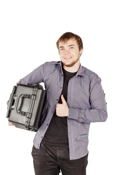 Young man with bag case  on a white background — Stockfoto