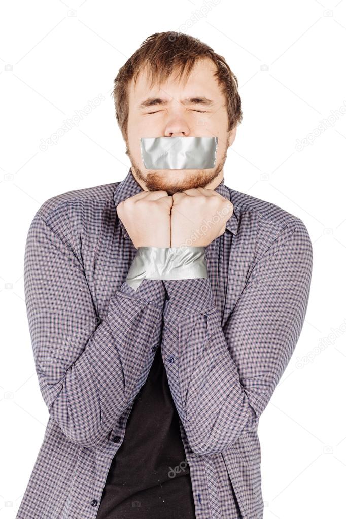 Man with mouth covered by masking tape