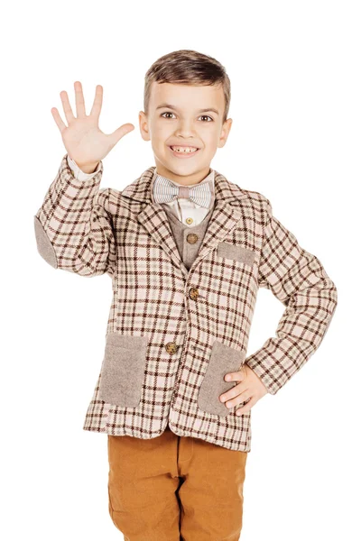 Portrait adorable young happy boy looking at camera isolated on — Stock fotografie