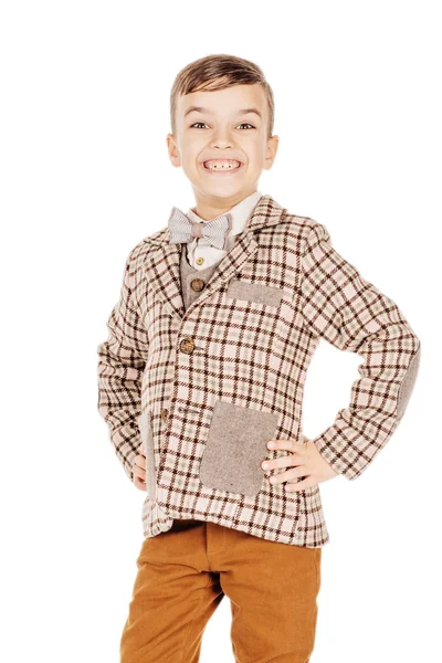 Portrait adorable young happy boy looking at camera isolated on — Stock fotografie