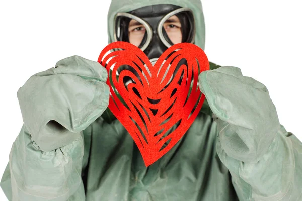 Man with protective mask and protective clothes with red heart — Stock Photo, Image