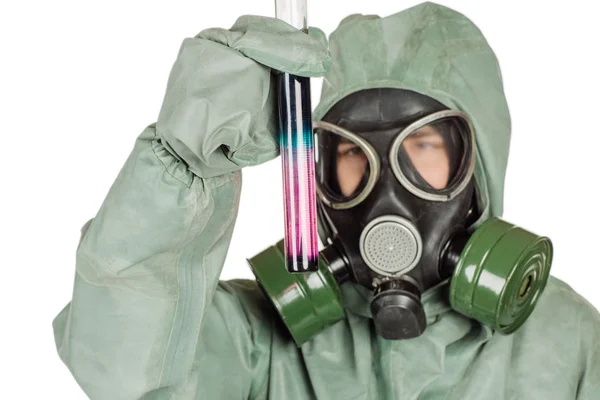 Man with protective mask and protective clothes examines a water sample — Stock Photo, Image