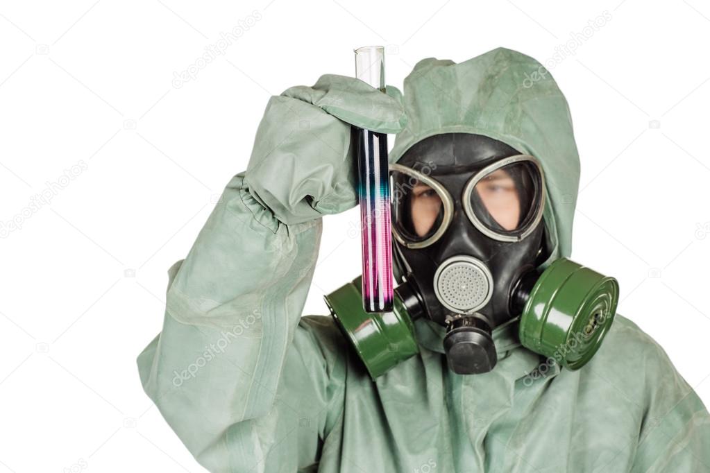 Man with protective mask and protective clothes examines a water sample