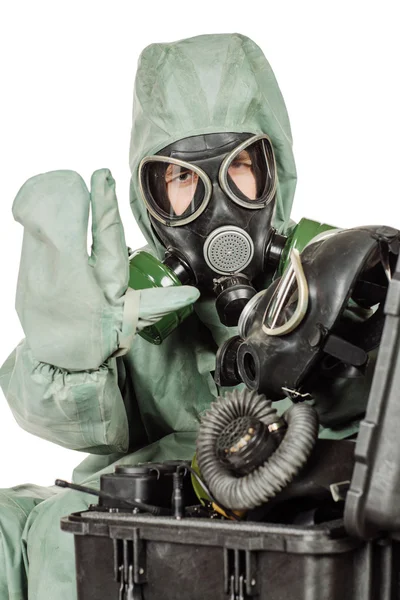 Man with protective mask and protective clothes prepares equipment for work — Stock Photo, Image