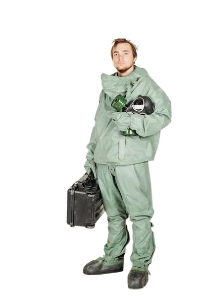 Man with protective mask and protective clothes prepares equipment for work — Stock Photo, Image