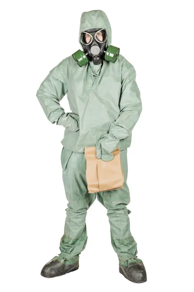 Homem com máscara protetora e roupa protetora segurando saco de papel — Fotografia de Stock