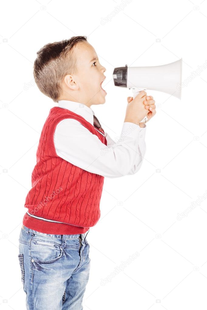 Portrait handsome young boy shouting with megaphone