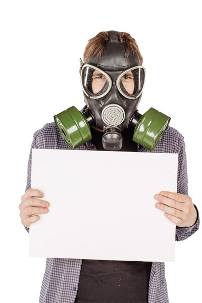 Man with protective gas holding a blank sheet of paper. portrait