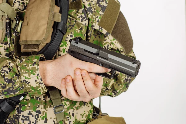 Soldier holding a black handgun. Training of soldiers firing wea — Stock Photo, Image