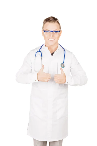 Doctor in white coat with stethoscope showing thumbs up sign.Peo — Stock fotografie