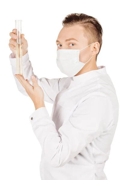 Medical doctor in white coat with stethoscope and mask holding a — Stock Photo, Image