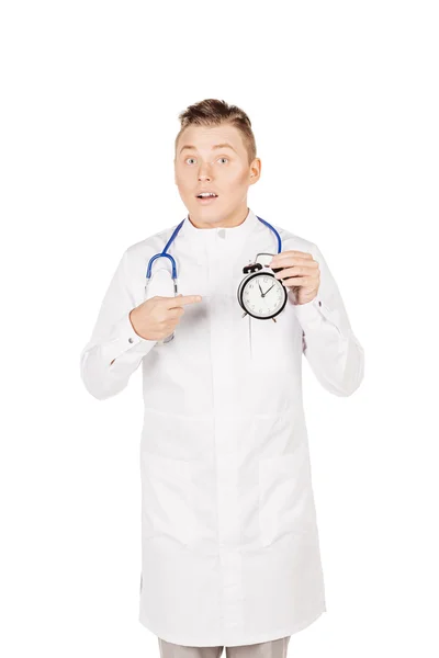 Ιατρικός γιατρός σε λευκό παλτό με στηθοσκόπιο που κρατά έξω ένα ala — Φωτογραφία Αρχείου