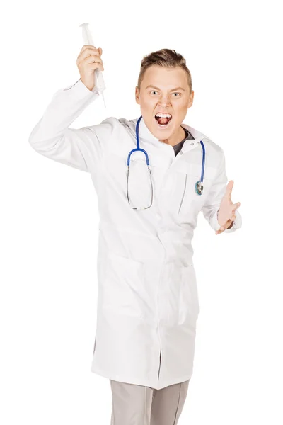 Rebel male doctor in white coat and stethoscope holding syringe. — 스톡 사진