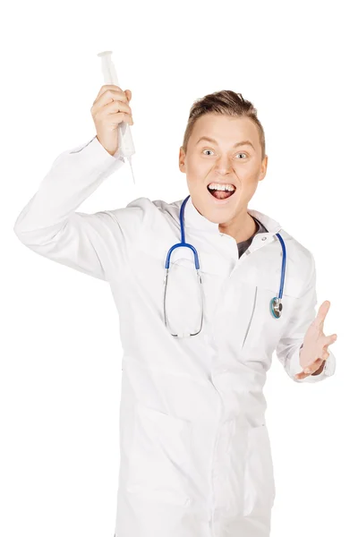 Rebel male doctor in white coat and stethoscope holding syringe. — 스톡 사진