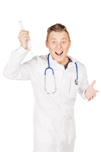 Rebel male doctor in white coat and stethoscope holding syringe. — 스톡 사진