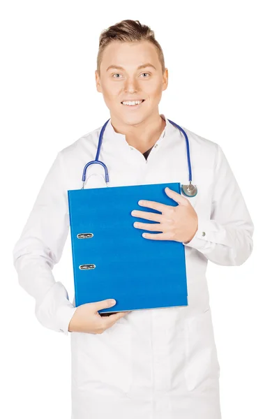 Young male doctor in white coat and stethoscope standing with bl — 스톡 사진