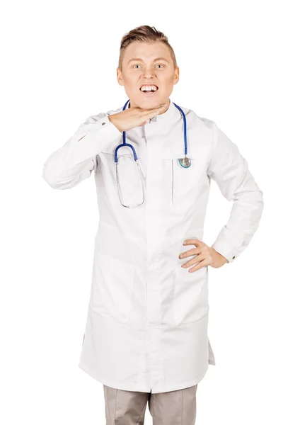 Mladý muž lékař v bílém pozadí — Stock fotografie