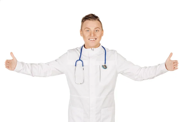 Young male doctor in white coat and stethoscope showing the size — Stock Fotó