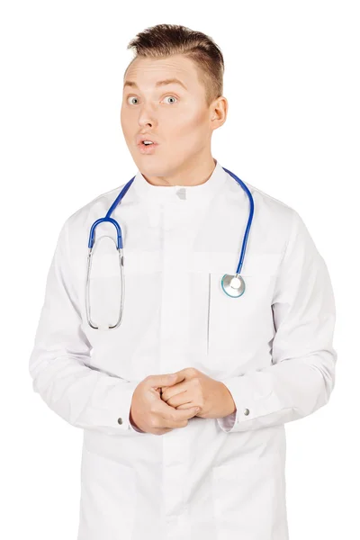 Young  male doctor in white coat and stethoscope posing surprise — 스톡 사진