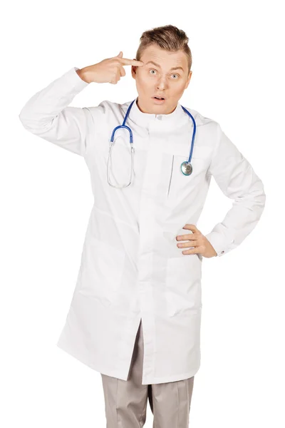 Jovem médico masculino de casaco branco gesticulando com o dedo agains — Fotografia de Stock