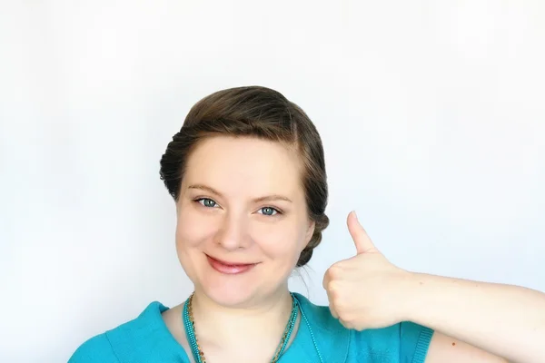 Portrait of young attractive women with thumbs up Stock Image