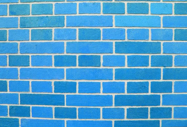 Streszczenie tekstury ściany z niebieskiej cegły przedstawiające w kolorach farby na starej ścianie z cegły. niebieski ceglany wzór tła ściany. Pomalowana ceglana ściana w niebieskim pustym miejscu do projektowania — Zdjęcie stockowe