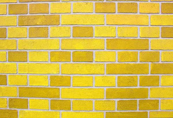 Streszczenie tekstury ściany z żółtej cegły przedstawiające w kolorach farby na starej ścianie z cegły. Wzór tła złotej cegły. Pomalowana ceglana ściana w żółtej pustej przestrzeni dla Twojego projektu — Zdjęcie stockowe